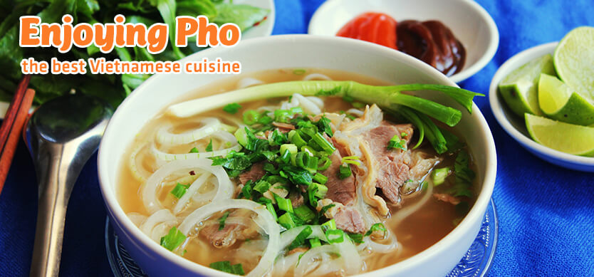 Enjoying Pho - the best Vietnamese cuisine