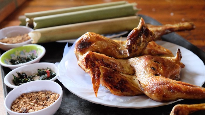 Bamboo-tube rice and grilled chicken in Mai Chau