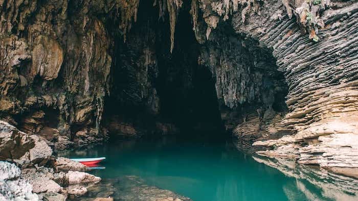  A clear green pond of Tu Lan cave