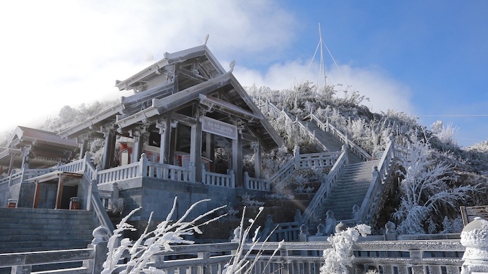 Admiring snow on Fansipan peak